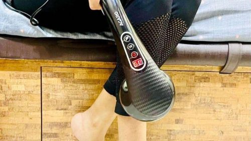 Using handheld massager on the leg. Best Handheld massager
