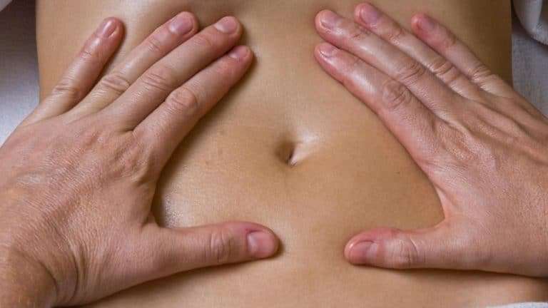 Using Theragun on Stomach