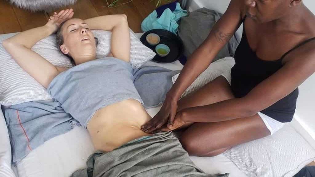 girl massaging her stomach