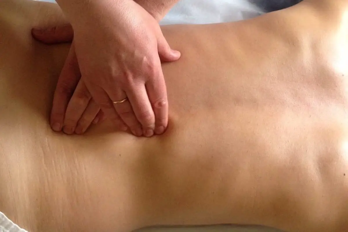 Percussion massage for pain sciatica 
