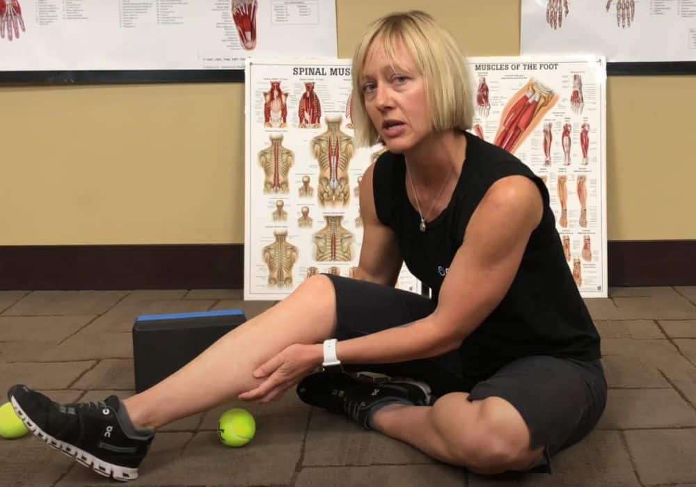 Massage the calves with a tennis ball