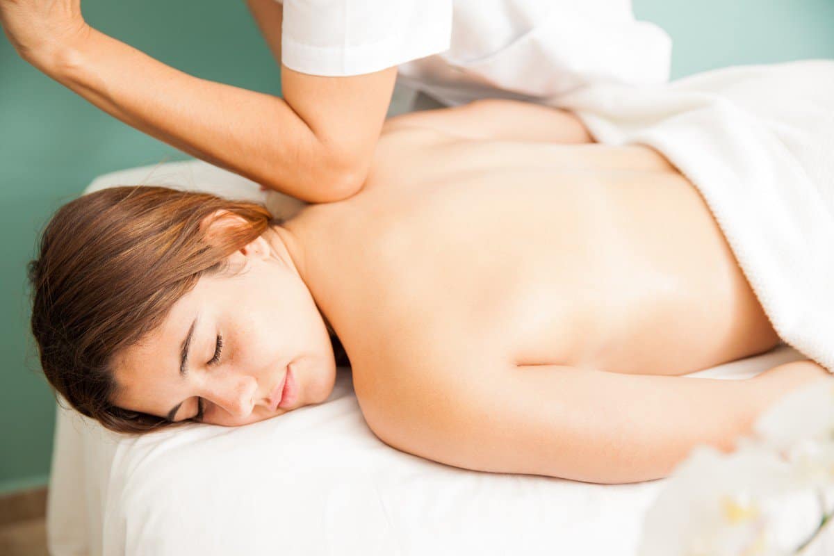 woman is getting a deep tissue massage