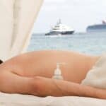 person gets a massage on the beach