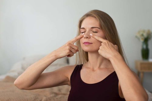 eye massage under-eye bags, puffiness, dark circles.