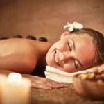 Portrait of happy female enjoying a massage