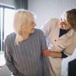 Lady who has had a stroke getting a massage