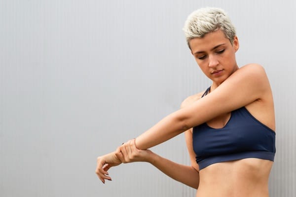 Should I stretch before or after massaging tight muscles